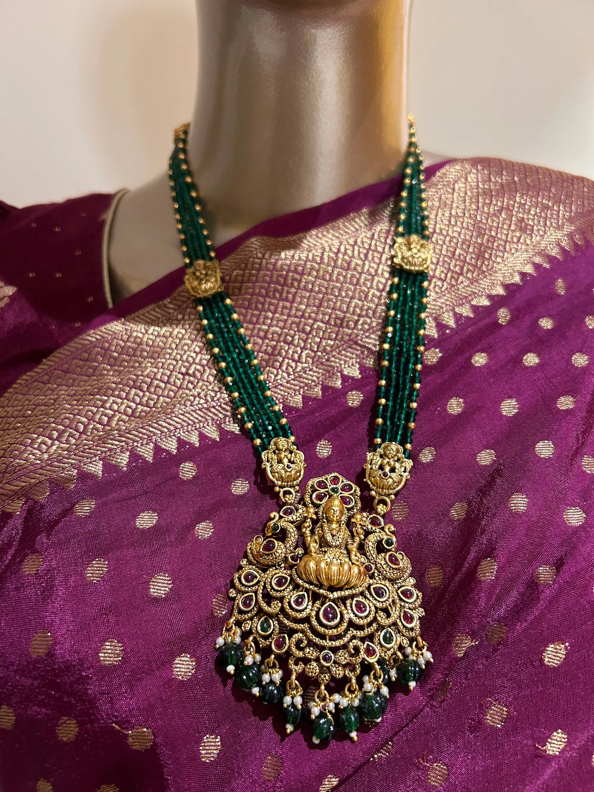 Long chain-green beads with Lakshmi Dollar Mandira Silks