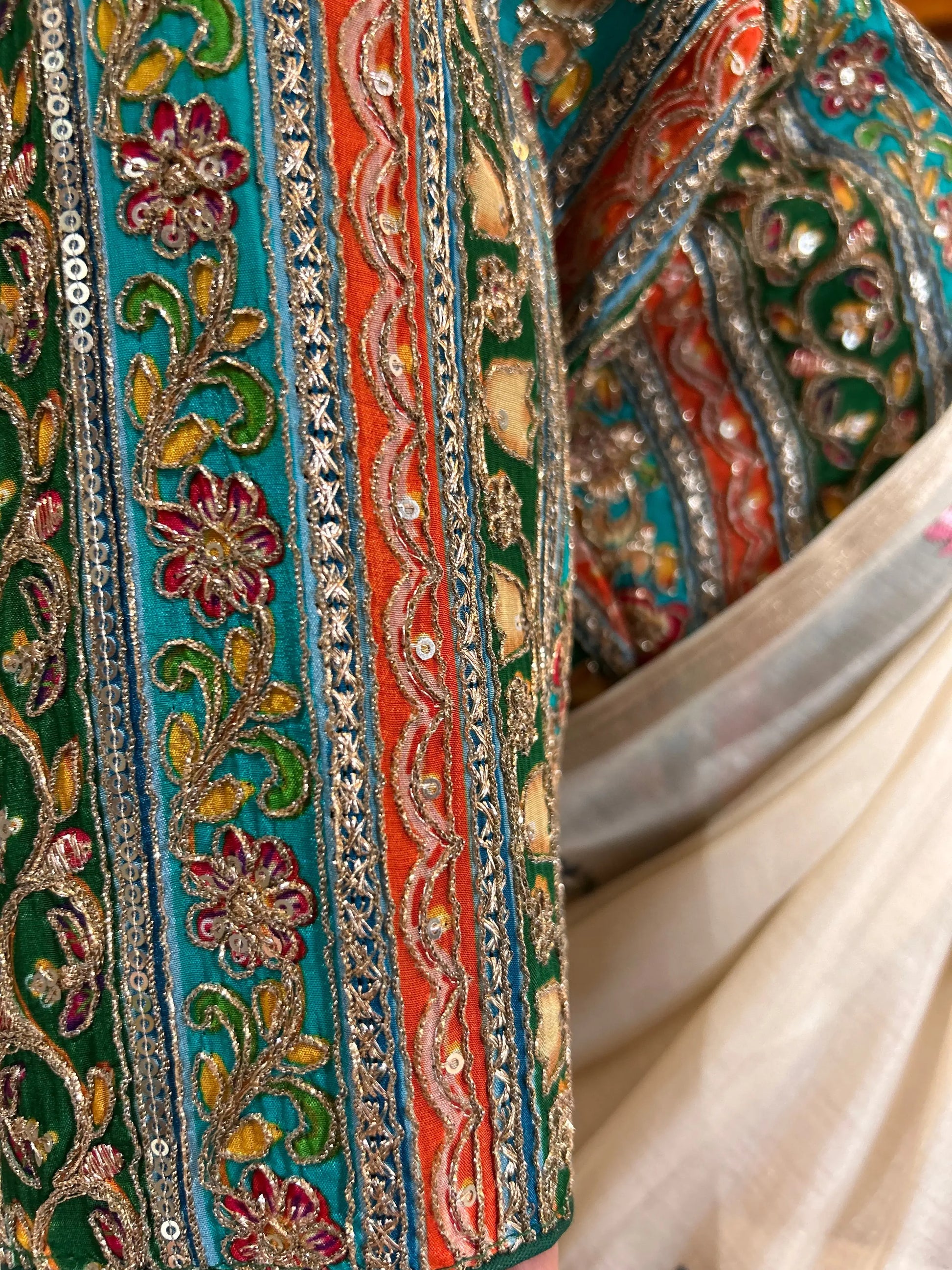 Wheatish white color Chapa Tussar by cotton Saree with embroidery work Mandira Silks
