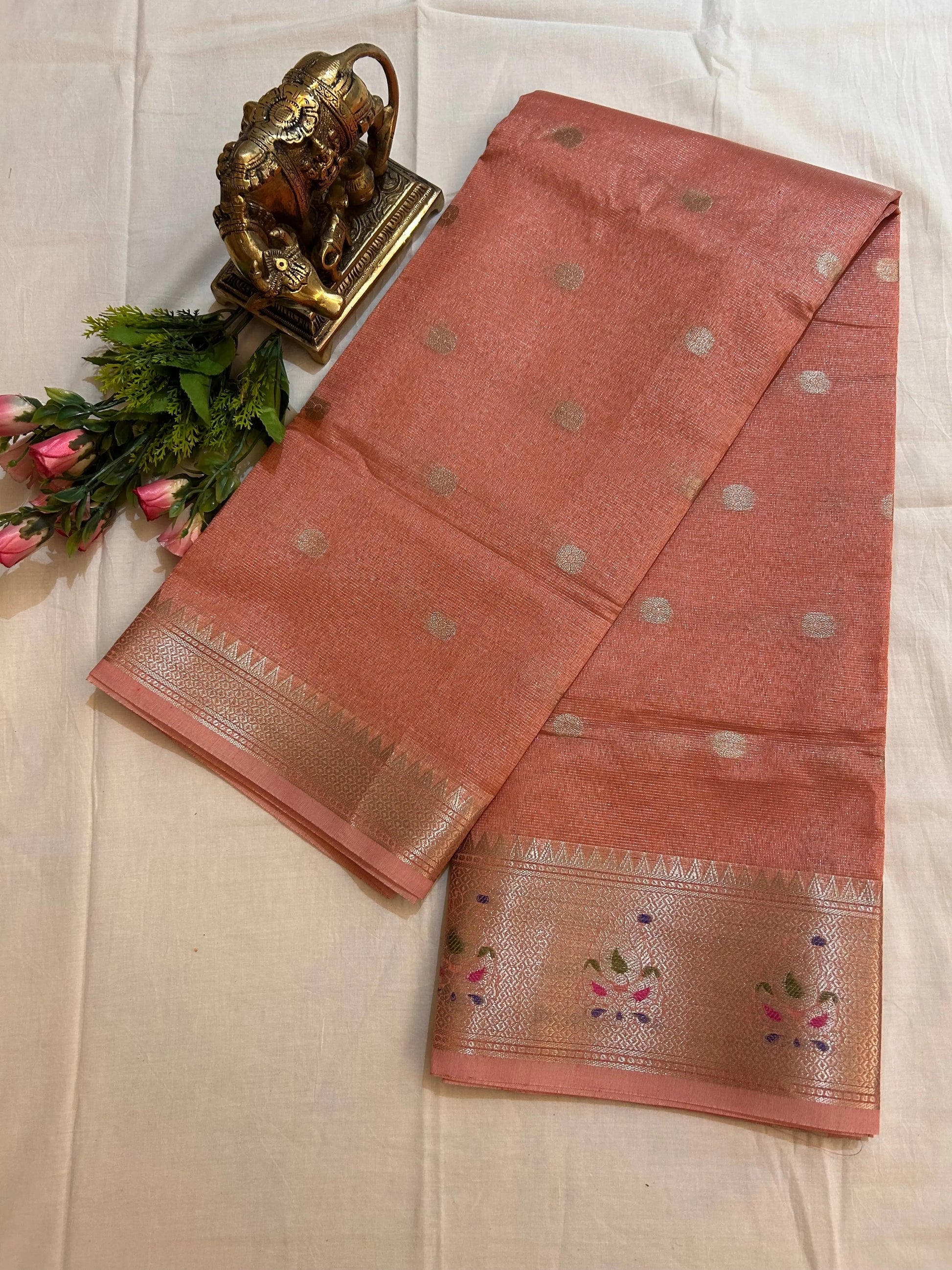 Pale Orange Color Kota Tissue Saree with Paitani border, buta all over the saree Mandira Silks